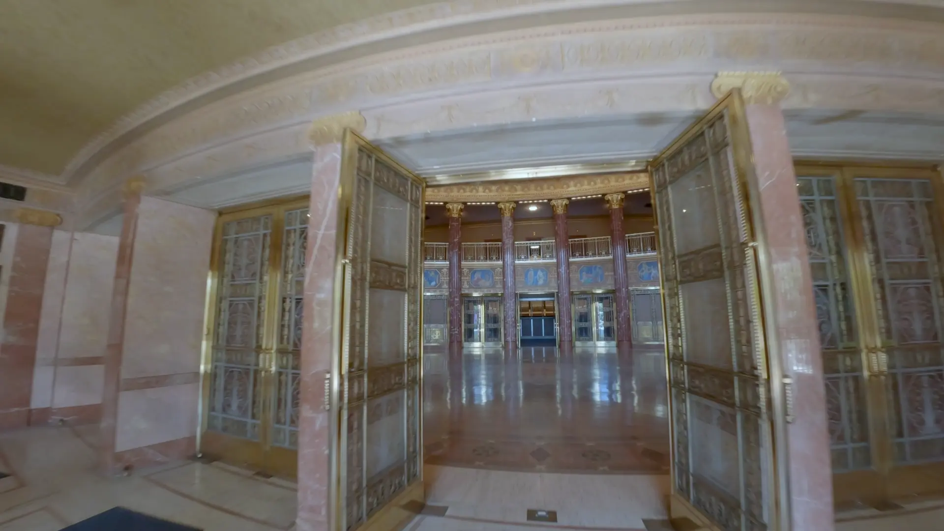 A cinematic fly-through of Severance Hall, gliding through the gilded marble lobby of the historic Cleveland concert hall.